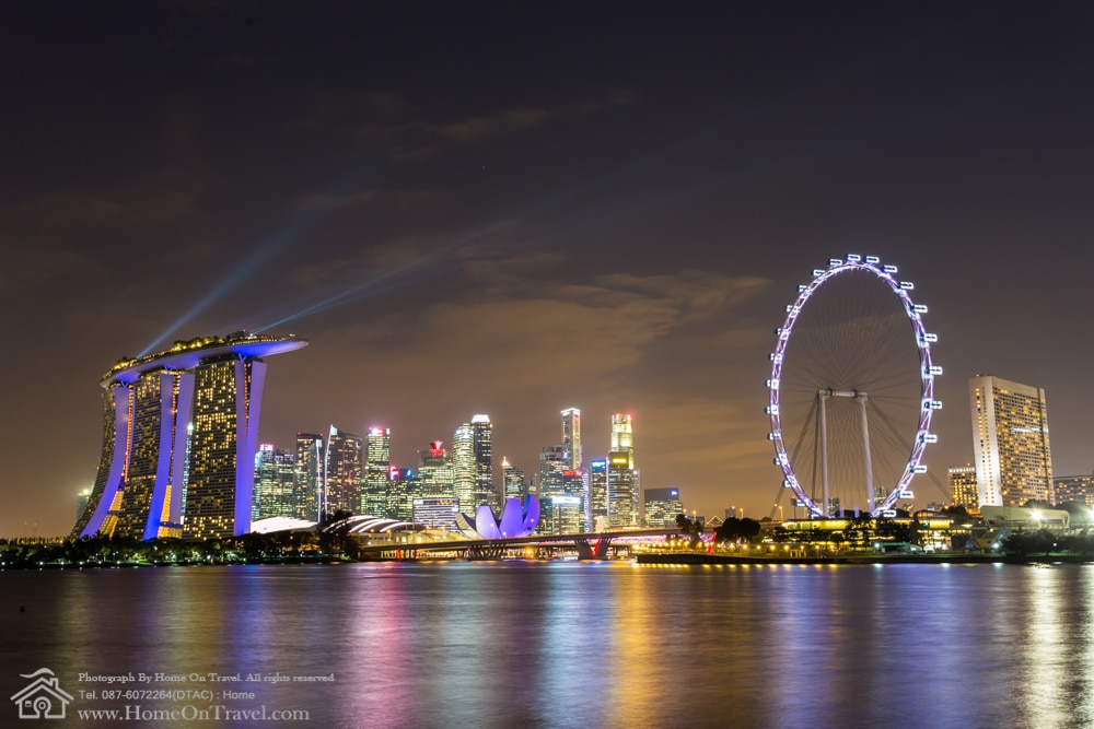 Home On Travel - Singapore city skyline at night with amazing of color sky with Marina bay sands Hotel and Singapore Flyer.